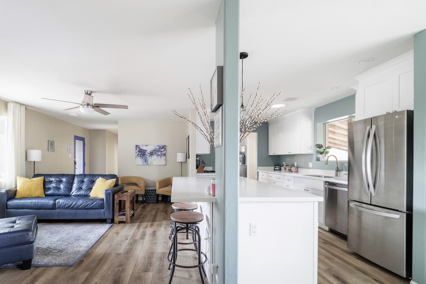 Lots of natural light in the Great Room for visiting, reading, or just enjoying nature out the large energy efficient windows. There is seating for 6 to 8 people. Or you can read a good book by the fireplace.